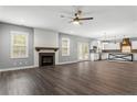 Open living space with fireplace and kitchen views at 78 Myrtle Oak Dr, Cameron, NC 28326