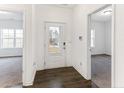 Bright entryway with wood-look floors and access to other rooms at 136 Parkview Ln, Lillington, NC 27546