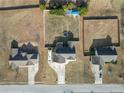 Aerial shot of the property showcasing the home's layout, landscaping, and surrounding neighborhood at 81 Jaylin Blvd, Spring Lake, NC 28390