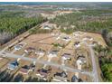 Aerial view of the neighborhood featuring well-maintained homes and spacious lots with mature trees at 81 Jaylin Blvd, Spring Lake, NC 28390