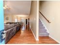 Hardwood floors and staircase leading to the second floor at 2817 Carolina Way, Sanford, NC 27332