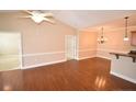 A large living room features hardwood floors and a ceiling fan at 159 Gallery Dr # 201, Spring Lake, NC 28390