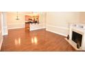 Spacious open living room with fireplace and wood floors at 159 Gallery Dr # 201, Spring Lake, NC 28390
