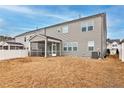 The backyard of this home features a covered patio and a privacy fence at 1029 Bellewood Park Dr, Angier, NC 27501