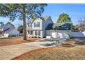 Charming two-story home with a well-maintained lawn and a two-car attached garage at 126 Ribbon Oak Court Ct, Sanford, NC 27332