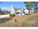 View of home showing manicured lawn, and tasteful landscaping at 126 Ribbon Oak Court Ct, Sanford, NC 27332