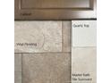 Close-up showcasing vinyl flooring, quartz top, cabinet and Primary bath tile surround elements at 293 Harborwood St, Lillington, NC 27546