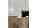 Close-up showcasing cabinet doors, granite countertop, and vinyl flooring samples at 305 Harborwood St, Lillington, NC 27546