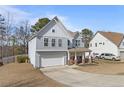 Attractive two-story home with a well-maintained lawn and a spacious driveway at 334 Heathrow Dr, Spring Lake, NC 28390