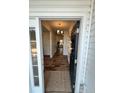 Inviting entryway with a decorative rug and views of the home's interior at 38 Cedarview Ct, Cameron, NC 28326