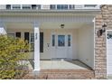 A close-up view of the front porch, showing the front door and house number at 25 Trenton Place, Cameron, NC 28326