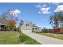 Well-maintained exterior showcasing the home's architecture, landscape, and curb appeal at 10 Glenside Ct, Spring Lake, NC 28390