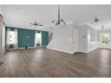 Open concept living space showcasing updated flooring and a seamless flow to the kitchen at 19 Double Barrel St, Lillington, NC 27546