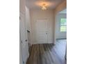 Welcoming entryway with sleek floors, and natural light at 122 Reece Dr, Sanford, NC 27332