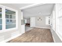 Inviting open-plan living space with hardwood flooring, large windows, and a seamless flow at 500 S 13Th St, Erwin, NC 28339