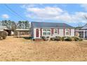 Inviting single-story home with a carport and well-kept front lawn at 2613 Watson Ave, Sanford, NC 27332