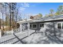 Spacious outdoor deck with covered area, perfect for entertaining or enjoying peaceful moments outdoors at 527 Perth Dr, Sanford, NC 27332