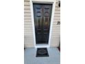 A welcoming black front door with white trim and a stylish welcome mat at 162 Deer Vw, Sanford, NC 27332