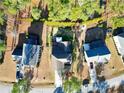 Aerial view of residences featuring well-maintained lawns and landscaping at 207 Heather Brook Cir, Spring Lake, NC 28390