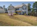 Charming two-story home with a two-car garage and a well-maintained front yard at 85 Clearview Ct, Sanford, NC 27332