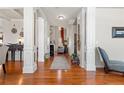 Grand foyer with hardwood floors, decorative columns, and an open view at 85 Clearview Ct, Sanford, NC 27332