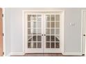 Elegant entryway featuring glass paneled double doors leading to living space at 202 Captain Hbr, Sanford, NC 27332