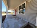 Covered front porch, offering an outdoor relaxation spot and curb appeal at 301 W Duke St, Dunn, NC 28334