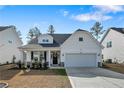 Charming home showcasing well-maintained lawn and craftsman-style design at 268 Kensington Dr, Spring Lake, NC 28390