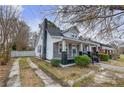 Charming home featuring a cozy covered porch and well-maintained landscaping at 321 Coleman Ave, Rocky Mount, NC 27801