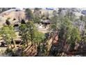 Areal view of home showcasing privacy, with mature tree coverage on property at 3524 June Rd, Sanford, NC 27332