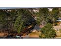 Areal view of home showcasing privacy, with mature tree coverage on property at 3524 June Rd, Sanford, NC 27332