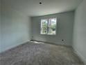 Well-lit bedroom featuring a window and ample natural light. Perfect for relaxation at 45 Pine Hill Ct, Spring Lake, NC 28390