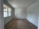 A spacious room with fresh paint and large window, awaiting your personal touch at 45 Pine Hill Ct, Spring Lake, NC 28390