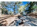 Charming home nestled amongst mature trees on large lot. Perfect for privacy and peaceful enjoyment at 488 Hall Rd, Erwin, NC 28339