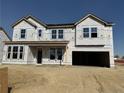 A new construction home with a two-car garage and covered front porch at 104 Steeple Rdg, Cameron, NC 28326