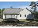 Backyard with a trampoline, offers space for outdoor activities at 42 Twin Ponds Rd, Sanford, NC 27332