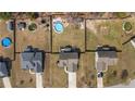 Wide aerial shot showcasing the property's pool, extensive lot, and neighborhood surroundings at 480 N Prince Henry Way, Cameron, NC 28326