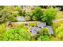 Expansive property with a swimming pool, gazebo, and lush greenery surrounding the home at 2007 Windmill Dr, Sanford, NC 27330