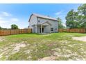 Spacious fenced backyard, offering plenty of room for outdoor activities and entertaining at 10 N Dakota Ct, Spring Lake, NC 28390