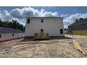 Expansive backyard featuring a wooden deck ready for entertaining at 28 Horse Trot Ln, Sanford, NC 27332