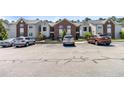 An expansive parking lot showcases available parking spaces in front of the apartment complex at 124 Gallery Dr # 302, Spring Lake, NC 28390