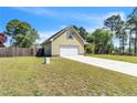 Attractive home featuring a spacious front yard and a driveway leading to the attached two-car garage at 45 Ridgecrest Rd, Cameron, NC 28326