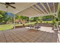 Covered patio with outdoor seating, perfect for entertaining and enjoying the backyard view at 940 Lakeridge Dr, Cameron, NC 28326