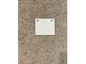 Close-up of neutral-toned carpeting with a 