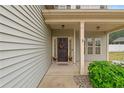 Inviting front entrance with covered porch and decorative wreath at 432 Century Dr, Cameron, NC 28326