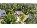 Aerial view of home showcasing property lines, surrounding trees, and neighborhood at 481 Clearwater Harbour, Sanford, NC 27332