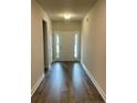 Inviting foyer with hardwood floors and a view of the front door at 55 Capeside Ct, Lillington, NC 27546