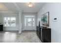 Bright foyer with a modern console table and elegant decor creating a welcoming entrance at 69 Streamline Ct, Lillington, NC 27546