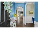 Welcoming foyer with elegant wood flooring and stylish decor at 123 Tun Tavern Dr, Cameron, NC 28326
