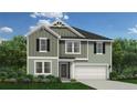 Charming two-story home with a two car garage and beautifully landscaped yard at 566 Blossom Trl, Lillington, NC 27546